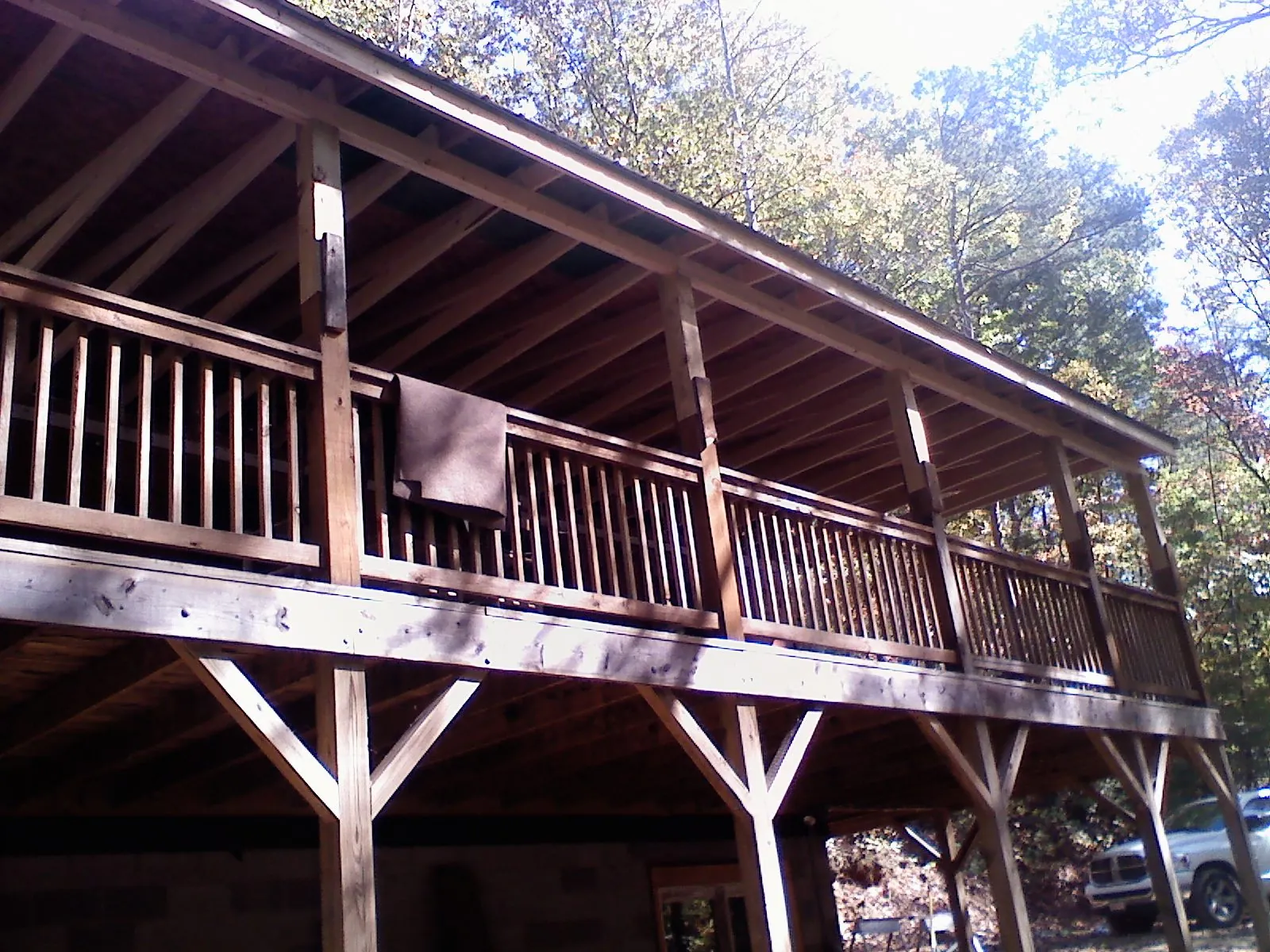 Timber framing under a new elevated porch and deck — Roof Leak Repair in La Plume by Roofing Brothers